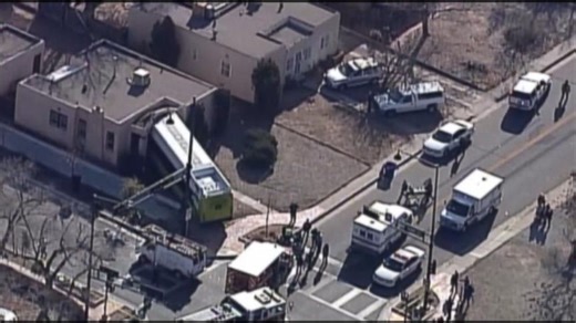 Bus Crashes Into Home