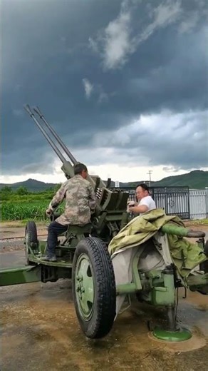 An artificial rainfall through anti aircraft artillery