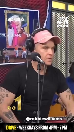 Talksports have shared a video of Robbie Williams performing All My Life from his album No. 1 Britpop earlier today. “Robbie Williams Performs "All My Life" from his New Album BRITPOP Live on Drive 🎶🎤 Listen to or watch Drive with Andy Goldstein and Darren Bent Weekdays from 4-7pm 📺” Team RWFANFEST ❤️ #robbiewilliams #TalkSports #AndyGoldstein #britpop #allmylife | Robbie Williams Fanfest