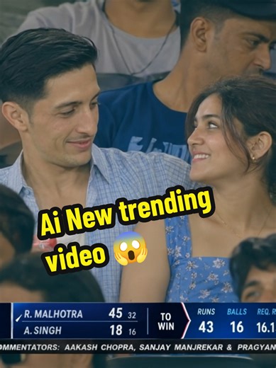 Ai cricket video New trend on TikTok tutorial “15-second ultra-realistic cricket stadium crowd video during a night T20 match. Use the uploaded face reference to create a similar-looking young man with matching hairstyle, facial structure, skin tone, and natural expression. He is sitting naturally in a packed stadium crowd beside a woman in a blue summer dress. Telephoto zoom camera style from far away like a live sports audience reaction shot. The man wears a light blue checkered shirt and hold