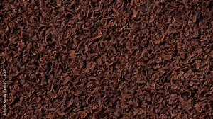 Ground dark chocolate slider shot. Ingredients for desserts and drinks