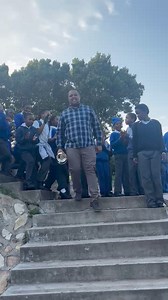 Ethon Alexander, the deputy principal of Fraaisig Primary School in Hornlee, Knysna, receives a hero's welcome as he arrives at the school today, Monday 7 October, after winning the national Excellence in Teaching Mathematics award at the finals of the Department of Basic Education's national teaching awards, held in Boksburg, Gauteng, on Saturday 5 October. | Knysna-Plett Herald