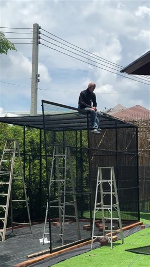 Construction d'un enclos pour un raton laveur et une volière