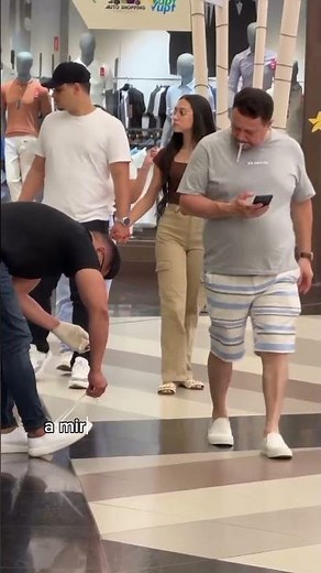 helping a man with a hand injury