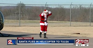 Santa to arrive in helicopter and visit with families at the Tulsa Air and Space Museum