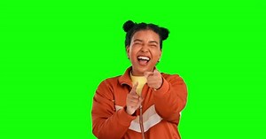 Woman, hand pointing and laughing face with green screen and happiness with selection