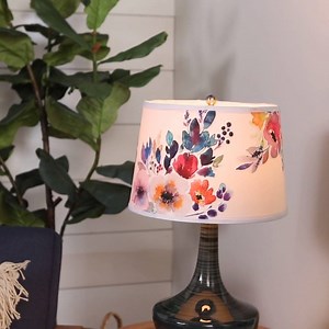 DIY Fabric Lampshade: Finding the perfect lighting fixture for a room can be tough. Take matters into your own hands by turning a plain white drum lampshade into a piece of art! Get the how-to: https://trib.al/RVYRkqG | Better Homes & Gardens