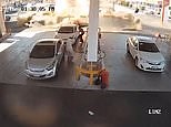 People in Saudi Arabia run amid explosion at service station
