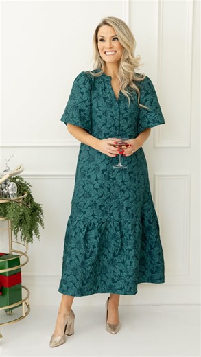 14 reactions | BEST SELLER, NEW COLOR! This gorgeous emerald green midi features a tonal textured floral fabric. The flowy silhouette is effortlessly elegant with short flutter sleeves and a ruffle hem. The split neckline has three covered button closures, and side pockets complete the look. Grab your size now!!壟✨ | The Blue Door Boutique | Facebook