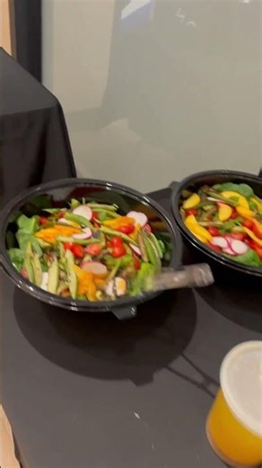 Vegetarian Sandwiches Salad and Dressing With Bottled Water and Flavored Water in cans