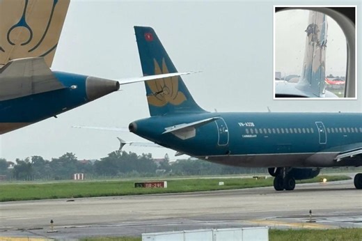 Vietnam Airlines suspends 4 pilots after Boeing jet collides with parked Airbus on runway, slicing through tail fin