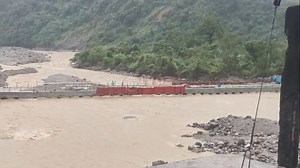 29K views · 235 reactions | Water level gradually rising , previously collapsed Dudhiya bridge and recently completed temporary bridge. Let's inform this is temporary bridge made up of hune pipes beneath covered by soil and gravels. | The Voice of Sikkim | Facebook