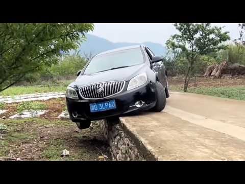 Car Overturns And Falls Onto Embankment; Old Machine Manages To Save Itself.