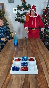 Who Will Win? Bottle Flip Tic Tac Toe 🎄🎄🎄 #fungame #games #fypage | Familyfuniq