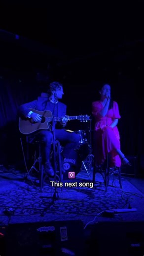 Maskit Mati on Instagram: "Singing in Hebrew at open mic!! Btw how sweet is this song?! The lyrics are a heartfelt letter from an older brother to his younger brother - offering life advice and wisdom🤍🙏🏼 #MichtavLeachi #liveperformance #songcover #hebrew #jewish #magendavid"