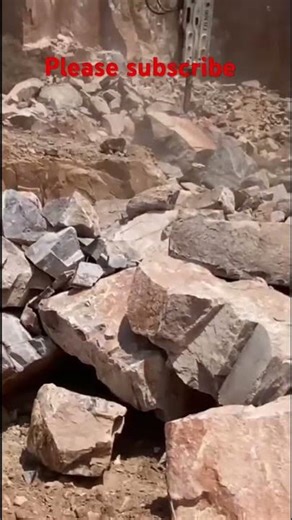 Digging stone in quarry in Rwanda