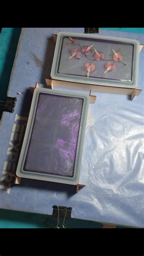 Watching my yard's Bleeding Hearts disappear into crystal clear resin... 🖤 Is there anything more therapeutic than a bubble-free pour? ✨ #ResinPour #satisfyingart #blackmoldresinart