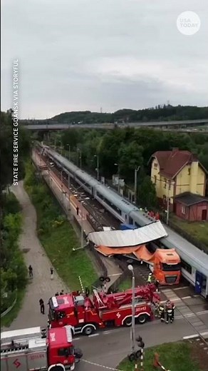 See the moment a train obliterates a truck trailer trapped on tracks