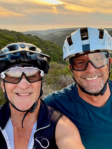 BAM! I’ve known this champion bloke for over 40 years. Back in the day we spent most of our time on the sun baked tennis courts of SoCal. The 1980’s were so cool in SoCal. We’ve now been MB riding together over 30 years, and we said we’d still be doing it when we’re 70. More years 🙏🏻 to go to get there. Keep going, Mike! Here’s to friendship! | Patrick Hourigan