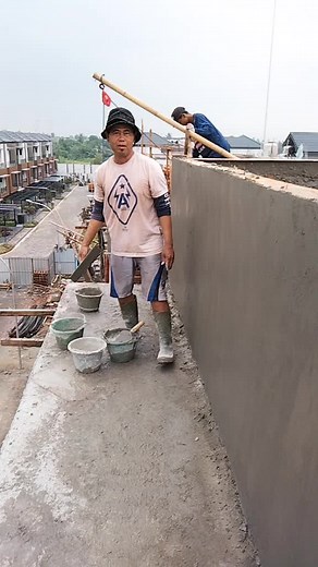 Construction Workers In Action on a Busy Site