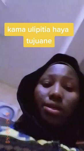 Stylish Hooded Garment Showcase in Dim Lighting