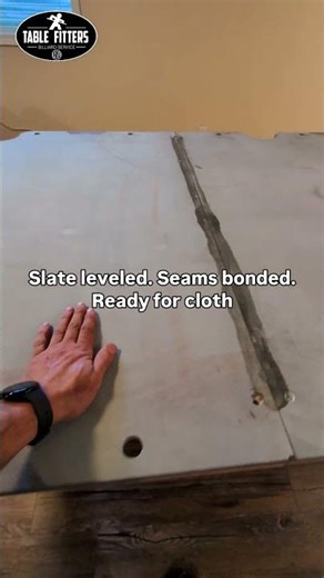 The slate is leveled. The seams are bonded. This pool table is ready for cloth