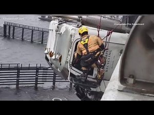 Crash leaves cab of tractor-trailer hanging off High Rise Bridge