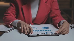 Audit concept,Administrator business man financial inspector and secretary making report calculating balance. Internal Revenue Service checking document.