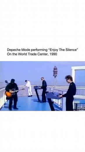 Good Music on Instagram: "In March 1990, Depeche Mode filmed a promotional performance of “Enjoy the Silence” on the roof of the South Tower of the World Trade Center in New York City. This wasn’t the official music video (which was directed by Anton Corbijn and featured singer Dave Gahan dressed as a king walking through various landscapes). Instead, this rooftop version was recorded for a French TV program called Champs-Élysées. The band members mimed the song on the 110th floor observation de