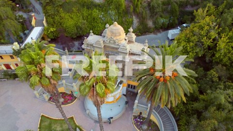 Neptuno fountain at santa lucía hill, surrounded by lush greenery in santiago, aerial view | Premium Stock Video Footage