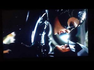 Catwoman kisses Batman