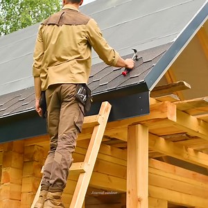 I making timber frame roof for my log cabin in the forest alone, installing roof shingles. | Vada Stracke