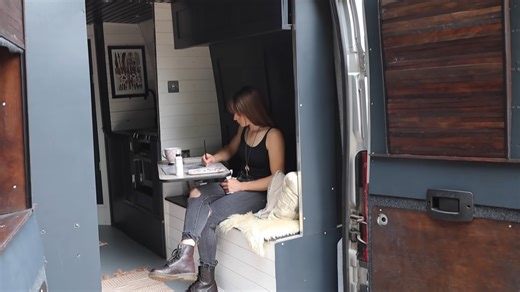 Custom Camper Van Was Built by a Skilled Artist, Boasts a Murphy Bed and a Unique Layout