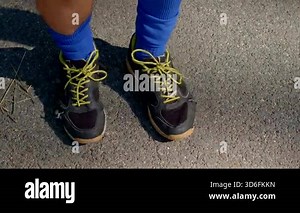 white man quick footwork in sneakers on pavement, fast steps and rhythm for cardio agility, focused lower body drills