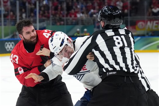 Tom Wilson fights in Canada's game vs. France at the Olympics