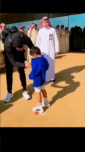 Cristiano Ronaldo give kid autograph