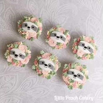 Sloth cupcakes with buttercream flowers