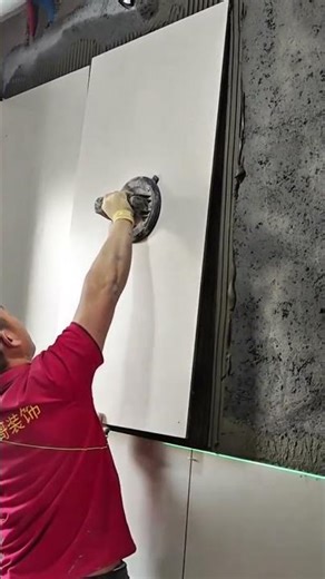 Interior Installation Using a Suction Cup to Lift and Place a Large Panel