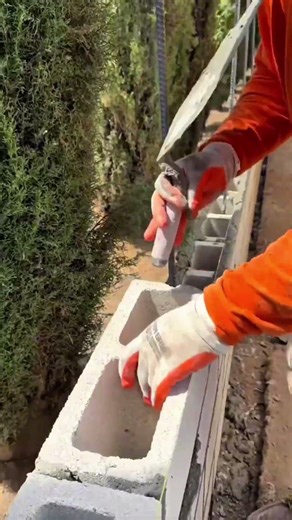 How to install reinforced concrete blocks on a wall surface quickly and tightly for foundations