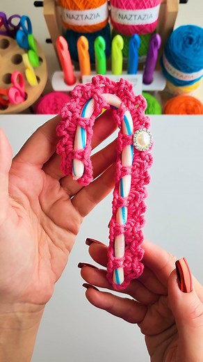 The Crochet Candy Cane Cozy is a cute decoration that also protects your candy canes. They are made with medium weight yarn and two rows of chain and single crochet stitches. #reels #crochet #knitting #artist #makersgonnamake #yarn #tutorial #candycanes #patterns #stockingstuffers #naztazia | Naztazia