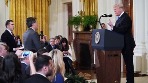 Trump clashes with Acosta in testy exchange