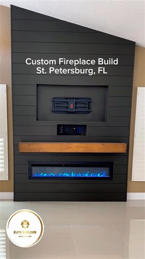 🔥Custom Fireplace Build – St. Petersburg, FL We transformed this living room with a modern feature wall that combines sleek black shiplap, a floating wood mantel, and a luxury electric fireplace with vibrant flame effects. Perfectly built to host a mounted TV and create the ultimate cozy yet stylish centerpiece ✨. 📍 St. Petersburg, Florida ✅ Custom Design ✅ Modern Finishes ✅ Built for Style Function At Elite Builder Renovation, we specialize in turning ordinary spaces into stunning focal point