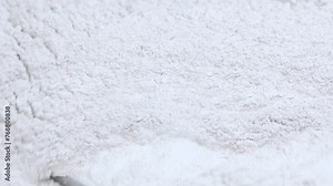 powder medicine mixing and blending process close up. dusting powder chemical pharma ingredient in a large equipment production line in a pharma manufacturing plant factory