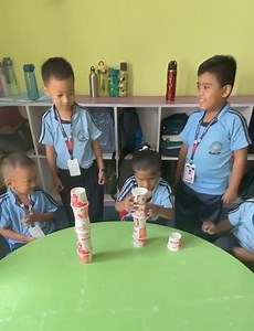Our UKG 'LILY' kids had a fantastic time today with a building and balancing activity! This fun and engaging task is an essential part of developing their fine motor skills. Keep up the great work, little architects! | K.K. International School, Dharan