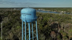 Old Homosassa Springs Florida Water Tower Pull-away with blue sunny skies
