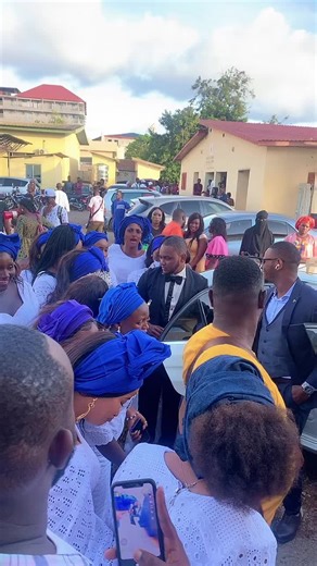 Celebrating Community Togetherness in White Attire