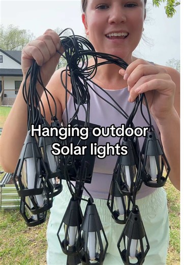 These 15 flickering outdoor solar lights really cozy up your outdoor space! #outdoors #solarpower #solarlights #outdoorlighting #garden