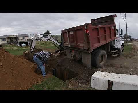 Installing a drainage pit