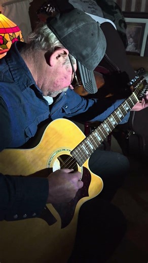 Dad Tuning Guitar and a Family Guy Reference