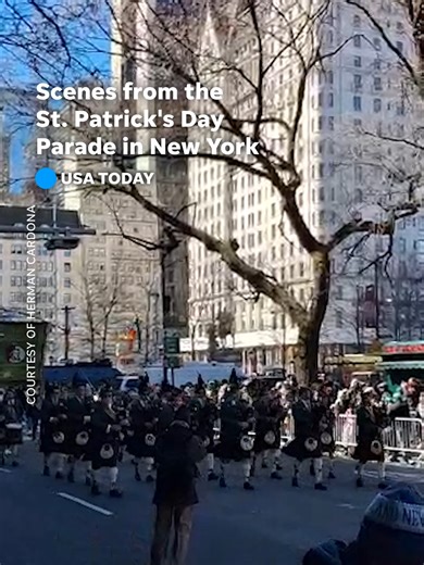 Bagpipes blare as fifth avenue turns green during the St. Patrick's Day Parade in New York City. #NYC #StPatricksDay #holidays